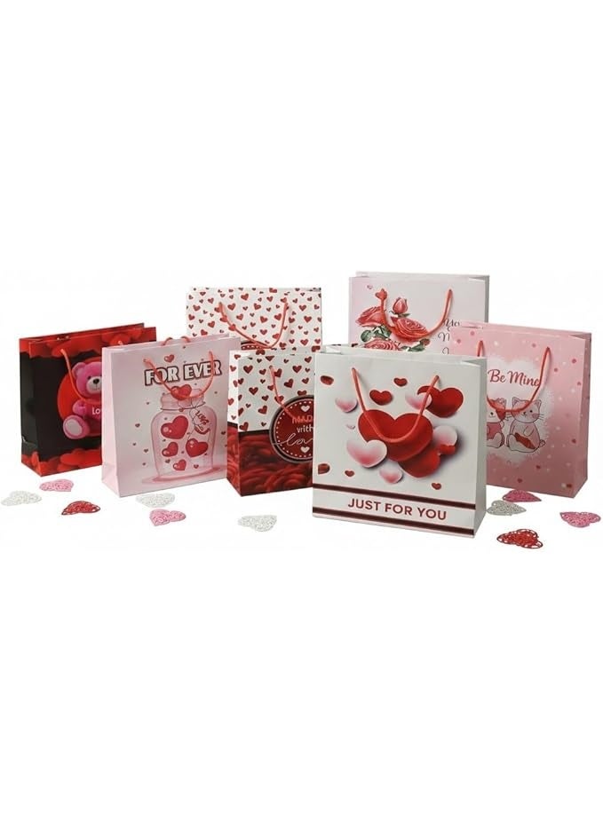 شنطة هدايا أنيقة وعصرية بأشكال مختلفة لجميع المناسبات – تصميم فاخر، متينة وعملية، مثالية لتقديم الهدايا بطريقة راقية وجذابة مقاس 18*18 سم (3 قطع ) - Image 1